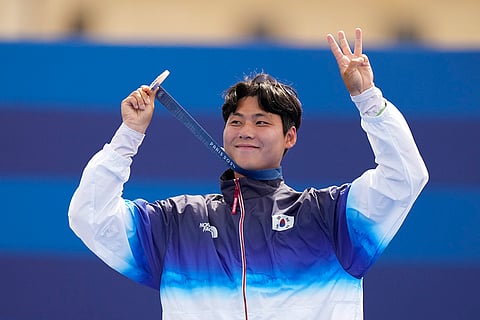 Archery men's individual medal ceremony: Bronze medal winner South Korea's Lee Woo-seok